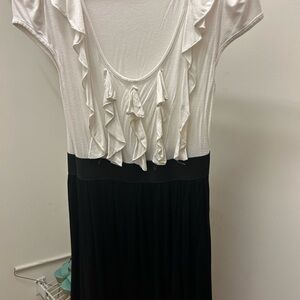 White and black dress with ruffles on chest